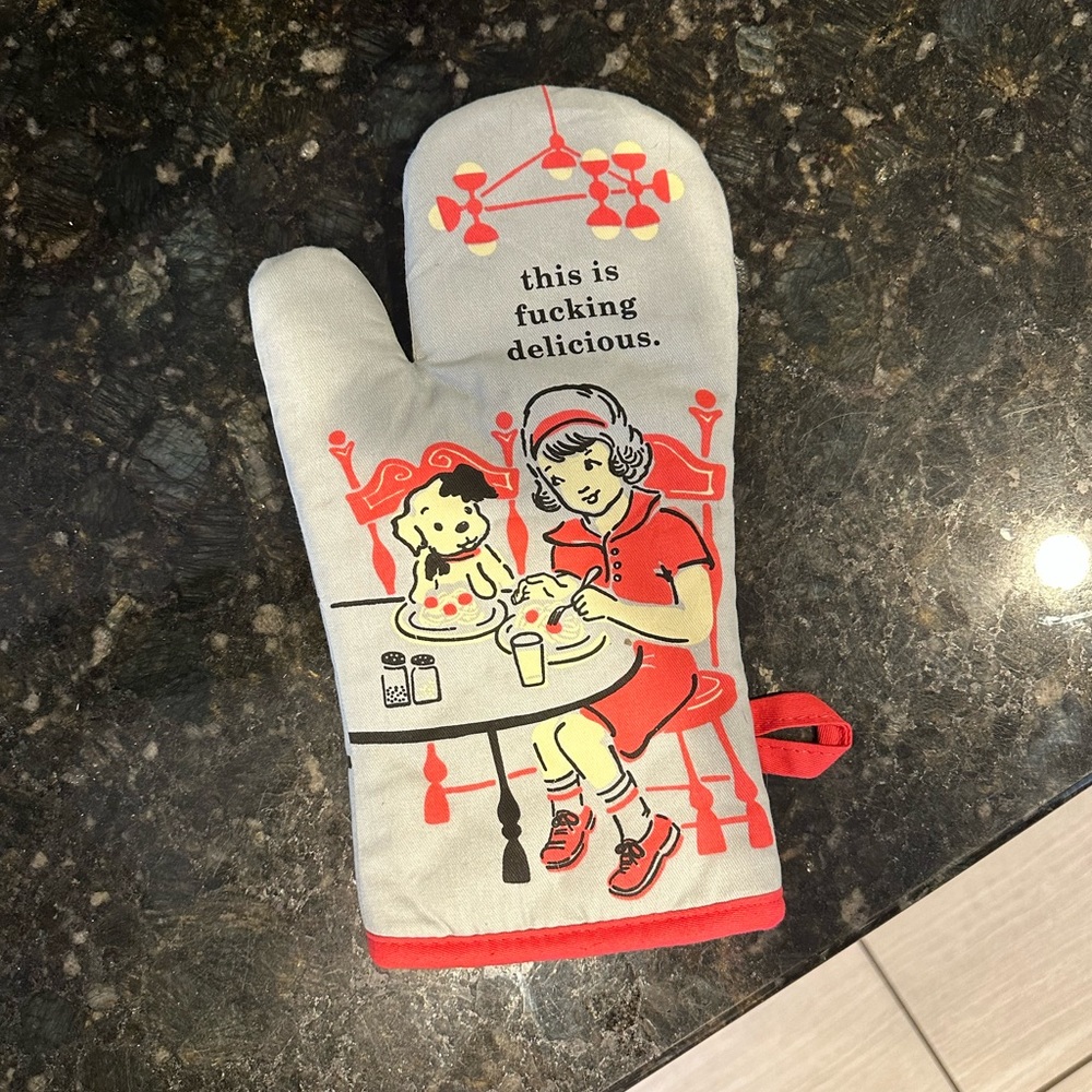 Blue Q “This is Fucking Delicious” oven mitt.